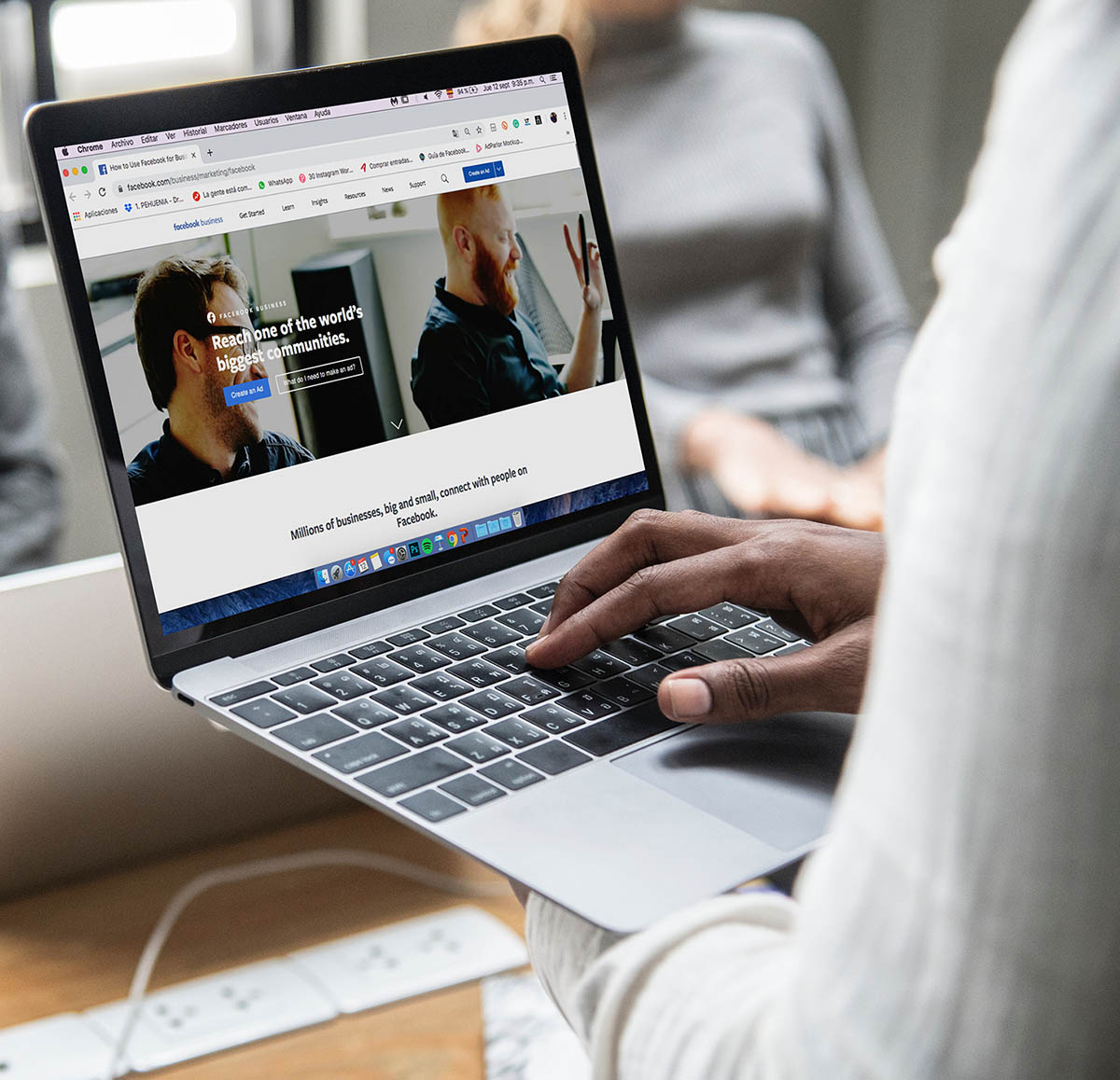 Facebook ads dashboard displayed on a laptop screen, showing ad performance metrics and campaign analytics for social media marketing